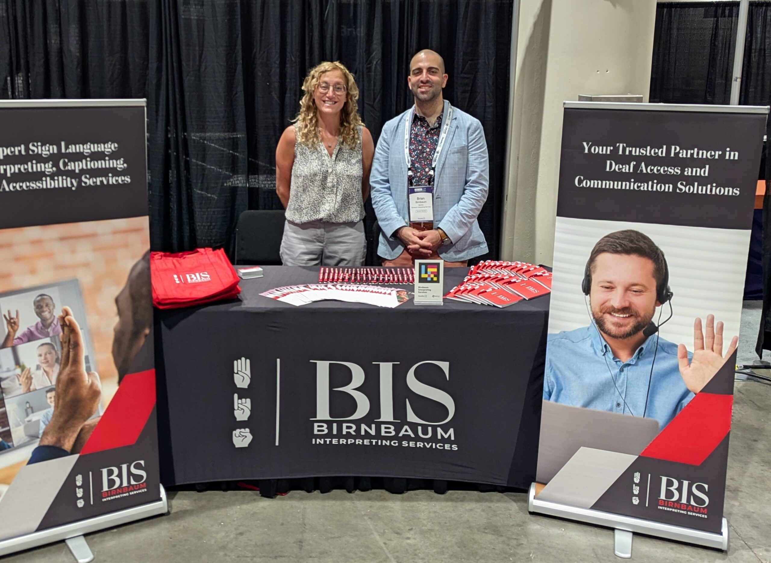 Brian Birnbaum and Connie Anderson at a BIS booth